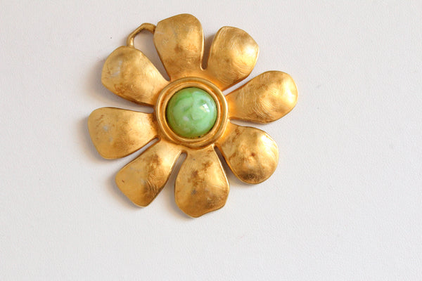 Signed Karl Lagerfeld Matte Goldtone Floral  pendant with green  cabochon #2880
