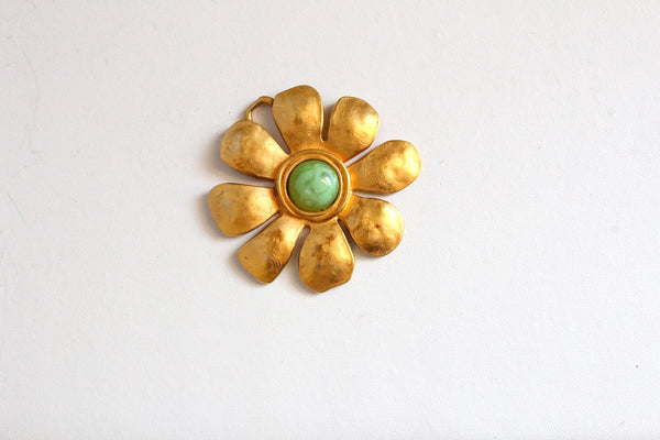 Signed Karl Lagerfeld Matte Goldtone Floral  pendant with green  cabochon #2880