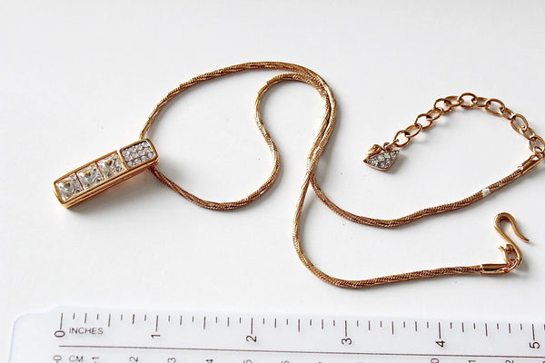 Swarovski gold tone necklace Marked with Swan # 1107