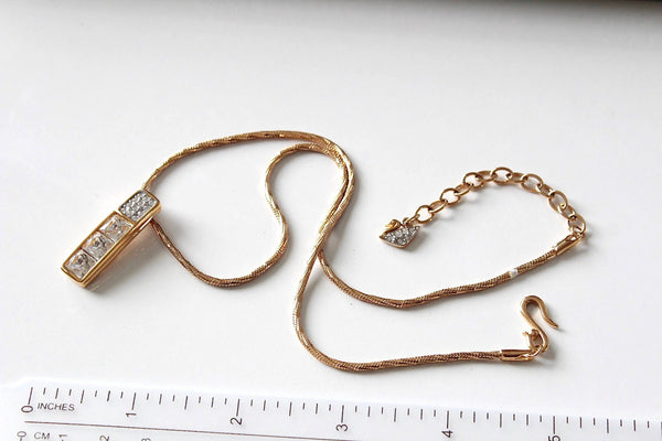Swarovski gold tone necklace Marked with Swan # 1107