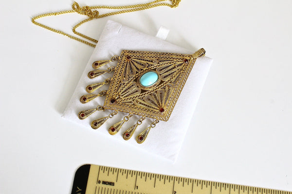 Victorian Filigree  Pendant with Turquoise cabochon and  Garnet  Rhinestones #579