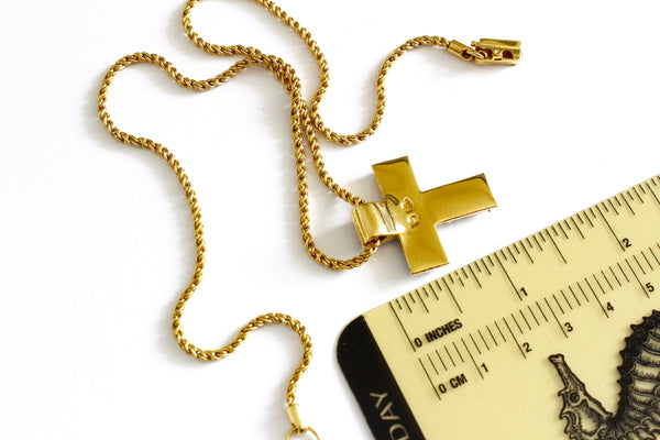 Swarovski gold tone chain with the cross shaped pendant Marked with Swan logo #976